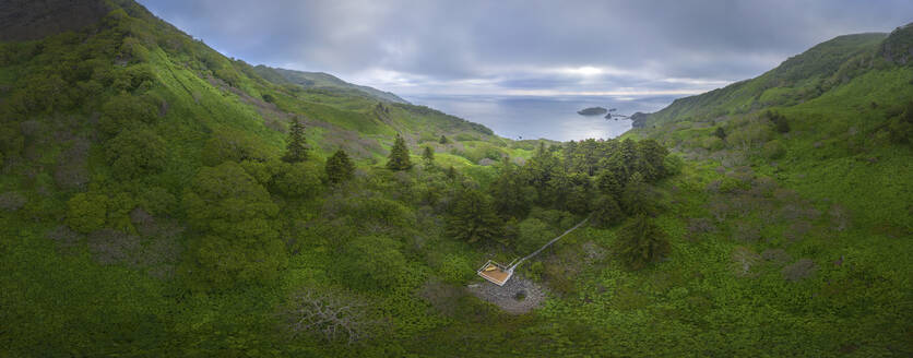 Aerial view of Ostrov Moneron island, Nevelsk, Sakhalin Oblast, Russia. - AAEF26443