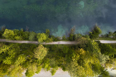 Aerial drone top view of emerald blue lake Bluntausee, Golling an der Salzach, Salzburg, Austria. - AAEF26792