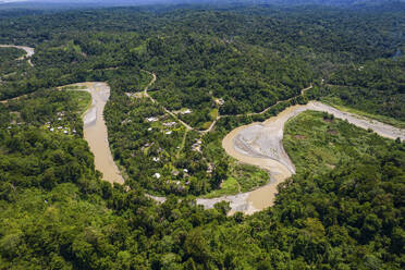 Aerial Drone View of Small Village Near to River in Jungle, East Sepik Province, Papua New Guinea. - AAEF26858