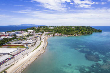 Aerial Drone View of Seaside of Wewak City, East Sepik Province, Papua New Guinea. - AAEF26899