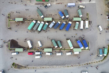 Aerial Top Down View of Buses in Wewak City, East Sepik Province, Papua New Guinea. - AAEF26907