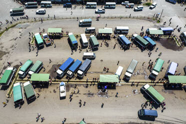 Aerial Drone View of Street with Buses, Wewak Town, East Sepik Province, Papua New Guinea. - AAEF26915