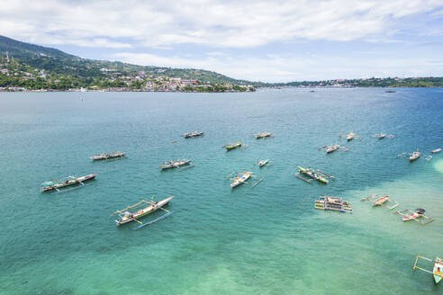 Aerial Drone View of Many Traditional Canoes in the Sea Near to Jayapura City, Indonesia. - AAEF26941