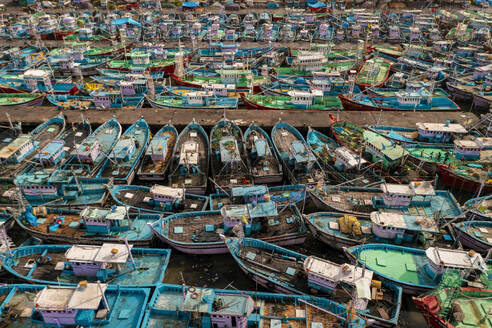 Aerial view of many boats and fishing boats docket at Malpe New Port, Udupi, Karnataka, India. - AAEF26990