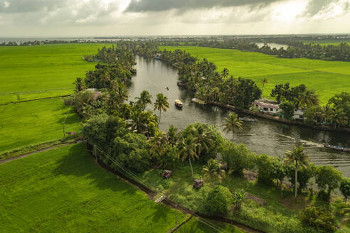 Aerial view of boats sailing the river water in Alappuzha, Kerala, India. - AAEF27000