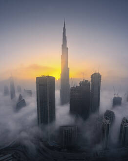 Aerial view of Downtown Dubai with Burj Khalifa, mist and fog, United Arab Emirates. - AAEF27016