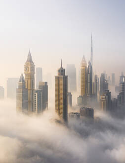 Aerial view of Burj Khalifa and Downtown Dubai in hazy atmosphere, Dubai, United Arab Emirates. - AAEF27027