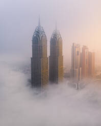 Aerial view of Dubai cityscape at dawn, al kazim towers and Sheik Zayed Road, Dubai, United Arab Emirates. - AAEF27028