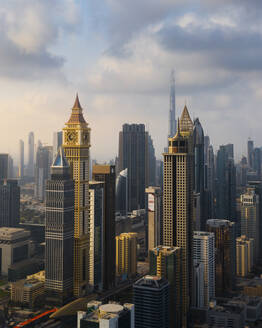 Aerial view of Downtown Dubai with Al Yaqoub Tower, Burj Khalifa and skyscrapers on Sheikh Zayed Road, UAE. - AAEF27037