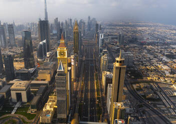 Aerial view of high-rise Al Yaqoub Tower in Downtown Dubai with busy traffic on Sheik Zayed Road, United Arab Emirates. - AAEF27038