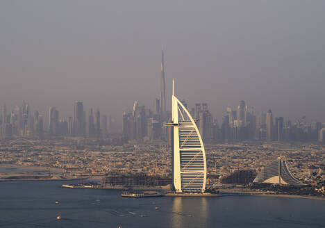 Aerial view of Dubai's coastal skyline at sunset, United Arab Emirates. - AAEF27044