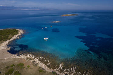 Aerial view of sailboat in Otok Oruda Island, Croatia. - AAEF27097