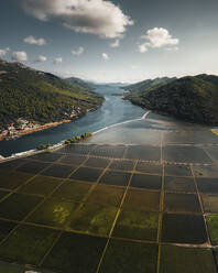 Aerial view of salt lake and swamp with coastal forest and river, Dubrovnik-Neretva, Croatia. - AAEF27112