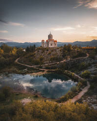 Aerial view of Vrelo Cetine, Lake and Vaznesenja Gospodnjeg church, Sibenik-Knin, Croatia. - AAEF27117