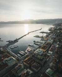 Aerial view of coastal town with marina and boats in sunset, Rijeka, Primorje-Gorski Kotar, Croatia. - AAEF27128