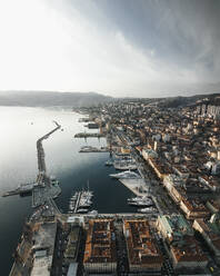 Aerial view of coastal town with marina and boats in sunset, Rijeka, Primorje-Gorski Kotar, Croatia. - AAEF27129