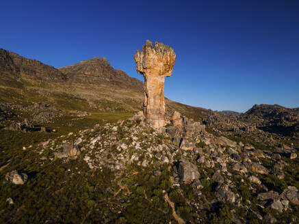 Aerial view of Maltese Cross amazing thirty meter rock formation at sunrise, Cederberg, Western Cape, South Africa. - AAEF27154