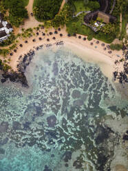 Aerial view of Pointe aux Canonniers coastline and clear Indian Ocean coastal reef, Grand Baie, Mauritius. - AAEF27160