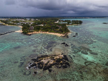 Aerial view of Pointe aux Canonniers coastline and clear Indian Ocean coastal reef, Grand Baie, Mauritius. - AAEF27163