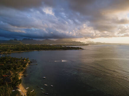 Aerial view of Balaclava Public Beach sunset looking onto Port Louis, Mauritius. - AAEF27181