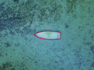 Aerial view of sunken fish boat on Balaclava Public Beach at sunset, Mauritius. - AAEF27186