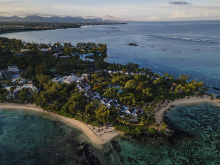 Aerial view of Pointe aux Canonniers coastline and clear Indian Ocean coastal reef, Grand Baie, Mauritius. - AAEF27190