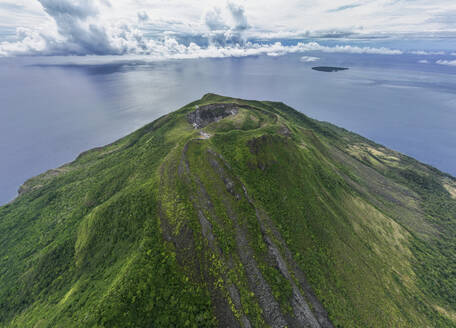 Aerial View of Ruang Volcano showing hardened lava stream in Sitaro Regency, Indonesia. - AAEF27235