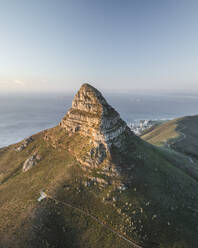 Aerial view of Signal Hill Nature Reserve (Lion's Rump), a landmark flat topped hill along the Atlantic Ocean coastline, Cape Town, Western Cape, South Africa. - AAEF27292