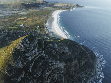 Aerial view of Chapman Peak with Noordhoek Beach along the coastline, Cape Peninsula National Park, Cape Town, Western Cape, South Africa. - AAEF27293