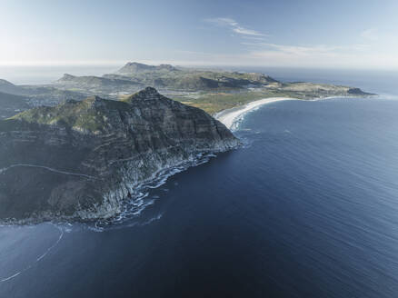 Aerial view of Chapman Peak with Noordhoek Beach along the coastline along the Hout Bay, Cape Peninsula National Park, Cape Town, Western Cape, South Africa. - AAEF27295