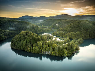 Aerial view of Plitvice National Park in Croatia at sunset. - AAEF27333