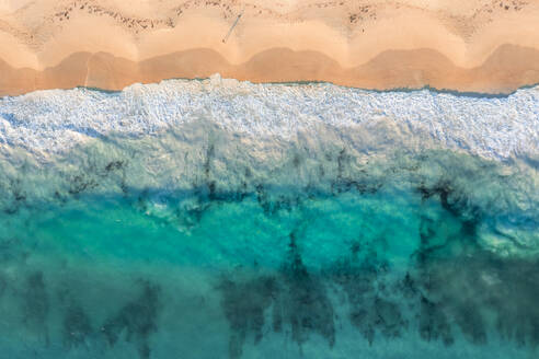 Aerial Drone view of waves in Mullaloo Beach, Western Australia, Australia. - AAEF27364