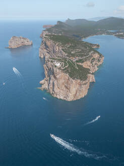 Aerial view of of a lighthouse along the coastline Capo Caccia, Sardinia, Italy. - AAEF27414