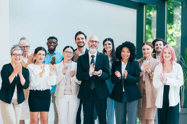 Businessmen and businesswomen making a corporate party after the business conference to celebrate the year goals and achievements. - DMDF10512