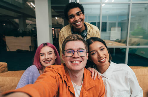 Cinematic image of a programming office with young programmers working on a new project for a start up business. - DMDF10828