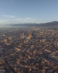 Aerial view of Cathedral of Santa Maria del Fiore, a gothic style church in Florence downtown at sunset, Florence, Tuscany, Italy. - AAEF27580