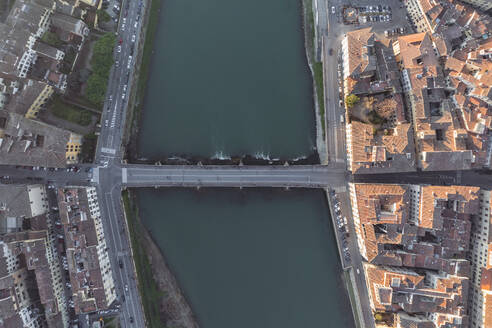 Aerial view of Ponte delle grazie crossing the Arno river in Florence downtown, Florence, Tuscany, Italy. - AAEF27583