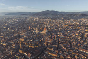 Aerial view of Cathedral of Santa Maria del Fiore, a gothic style church in Florence downtown at sunset, Florence, Tuscany, Italy. - AAEF27585