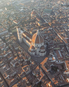 Aerial view of Cathedral of Santa Maria del Fiore, a gothic style church in Florence downtown at sunset, Florence, Tuscany, Italy. - AAEF27596