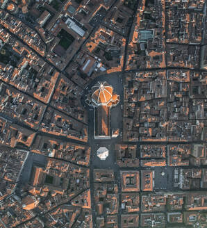 Aerial panoramic view of Cathedral of Santa Maria del Fiore and the The Baptistery of St. John, a gothic style church in Florence downtown at sunset, Florence, Tuscany, Italy. - AAEF27599