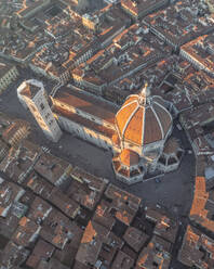Aerial view of Cathedral of Santa Maria del Fiore, a gothic style church in Florence downtown at sunset, Florence, Tuscany, Italy. - AAEF27606