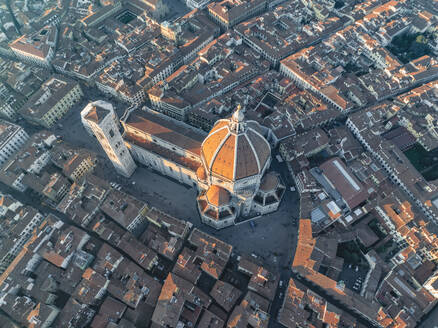 Aerial view of Cathedral of Santa Maria del Fiore, a gothic style church in Florence downtown at sunset, Florence, Tuscany, Italy. - AAEF27607