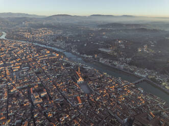 Aerial view of Basilica di Santa Croce, a landmark catholic church in Florence downtown at sunset, Tuscany, Italy. - AAEF27616