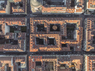 Aerial top down view of rooftops in Turin downtown at sunset, Turin, Piedmont, Italy. - AAEF27618