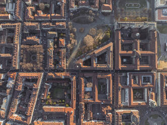 Aerial top down view of rooftops in Turin downtown at sunset, Turin, Piedmont, Italy. - AAEF27649