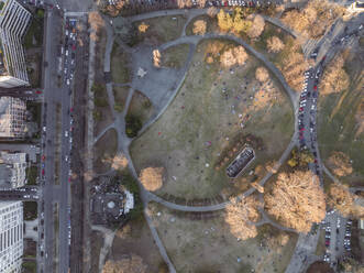Aerial view of people at Valentino Public Gardens and Park in Turin downtown, Turin, Piedmont, Italy. - AAEF27665