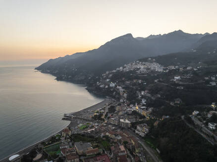 Aerial view of Vietri sul Mare old town at sunset, an old town along the Amalfi Coast facing the Mediterranean Sea, Salerno, Campania, Italy. - AAEF27677