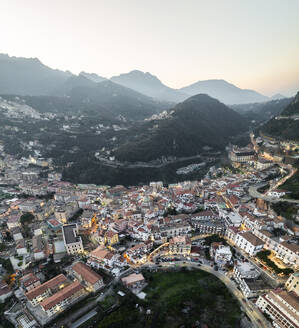 Aerial view of Vietri sul Mare old town at sunset, a small town along the Amalfi Coast with Lattari Mountain range and national park in background, Salerno, Campania, Italy. - AAEF27678