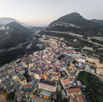 Aerial view of Vietri sul Mare old town at sunset, a small town along the Amalfi Coast with Lattari Mountain range and national park in background, Salerno, Campania, Italy. - AAEF27680