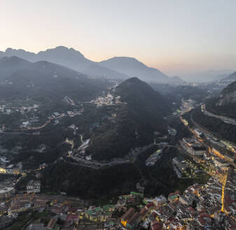 Aerial view of Vietri sul Mare old town at sunset, a small town along the Amalfi Coast with Lattari Mountain range and national park in background, Salerno, Campania, Italy. - AAEF27686